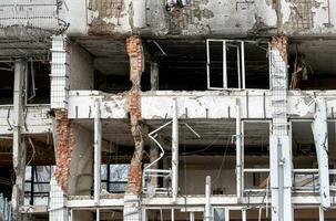 destroyed and burned houses in the city Russia Ukraine war photo