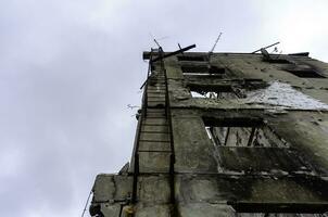 destroyed and burned houses in the city Russia Ukraine war photo