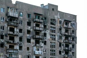 destroyed and burned houses in the city Russia Ukraine war photo