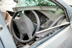 damaged and looted cars in a city in Ukraine during the war photo