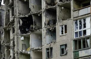 destroyed and burned houses in the city Russia Ukraine war photo