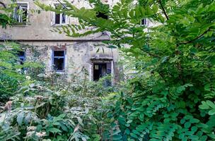 destroyed and burned houses in the city Russia Ukraine war photo