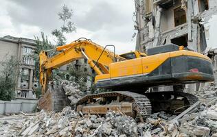 destroyed and burned houses in the city in Ukraine war photo