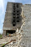 destroyed and burned houses in the city Russia Ukraine war photo