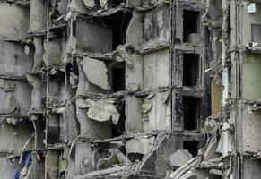 destroyed and burned houses in the city Russia Ukraine war photo