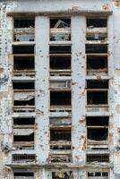 destroyed and burned houses in the city Russia Ukraine war photo