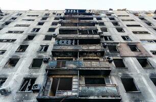 destroyed and burned houses in the city Russia Ukraine war photo