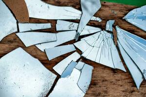 shards of a broken mirror close up photo