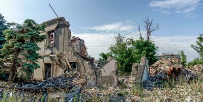 destroyed and burned houses in the city Russia Ukraine war photo