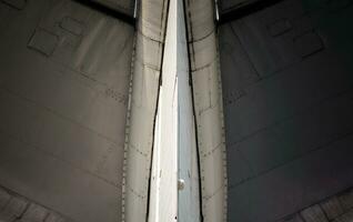 technical aviation background fragment of an airplane wings photo