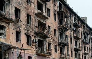 destroyed and burned houses in the city Russia Ukraine war photo