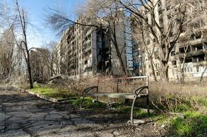 destroyed and burned houses in the city Russia Ukraine war photo