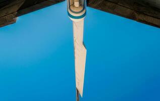 wings of a large airliner on a blue background photo