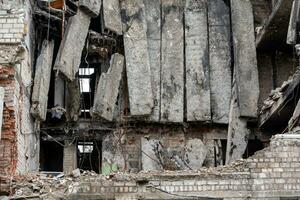 destroyed and burned houses in the city Russia Ukraine war photo