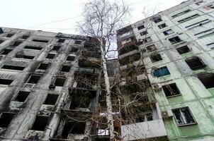 destroyed and burned houses in the city Russia Ukraine war photo