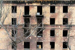 destroyed and burned houses in the city Russia Ukraine war photo