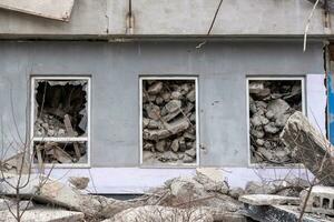 destroyed and burned houses in the city Russia Ukraine war photo