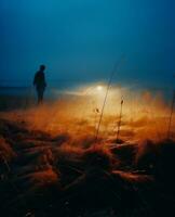 AI generated Man running in the field at sunrise with fog in the background. photo