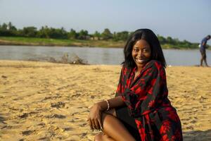 outdoor fashion photo of beautiful happy lady at the beach