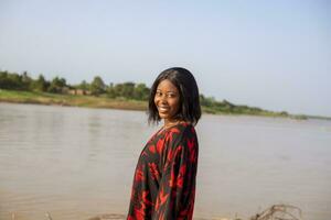 outdoor fashion photo of beautiful happy lady at the beach