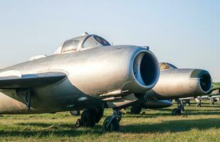 old soviet army military fighter aircraft at the airport photo