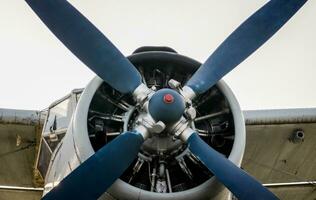 cockpit propeller and wing of an old vintage airplane photo