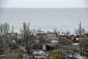 destroyed and burned houses in the city Russia Ukraine war photo