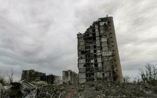 destroyed and burned houses in the city Russia Ukraine war photo