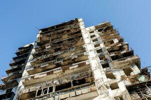 destroyed and burned houses in the city Russia Ukraine war photo