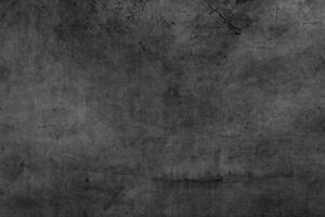 Grunge textured dark concrete wall background photo