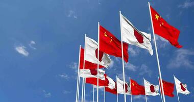 Japan and China Flags Waving Together in the Sky, Seamless Loop in Wind, Space on Left Side for Design or Information, 3D Rendering video