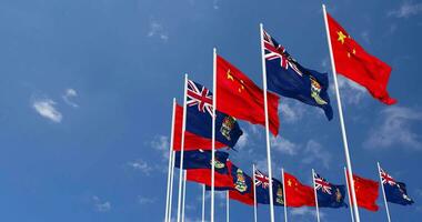 Cayman Islands and China Flags Waving Together in the Sky, Seamless Loop in Wind, Space on Left Side for Design or Information, 3D Rendering video