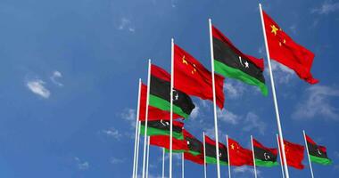 Libya and China Flags Waving Together in the Sky, Seamless Loop in Wind, Space on Left Side for Design or Information, 3D Rendering video