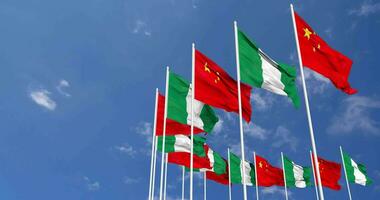 Nigeria and China Flags Waving Together in the Sky, Seamless Loop in Wind, Space on Left Side for Design or Information, 3D Rendering video