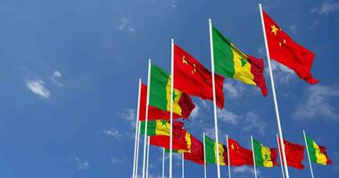 Senegal and China Flags Waving Together in the Sky, Seamless Loop in Wind, Space on Left Side for Design or Information, 3D Rendering video