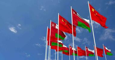 Oman and China Flags Waving Together in the Sky, Seamless Loop in Wind, Space on Left Side for Design or Information, 3D Rendering video