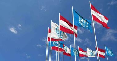 Austria and United Nations, UN Flags Waving Together in the Sky, Seamless Loop in Wind, Space on Left Side for Design or Information, 3D Rendering video