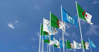 Algeria and United Nations, UN Flags Waving Together in the Sky, Seamless Loop in Wind, Space on Left Side for Design or Information, 3D Rendering video