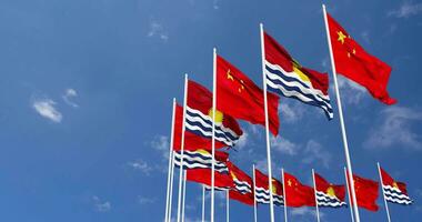 Kiribati e China bandeiras acenando juntos dentro a céu, desatado ciclo dentro vento, espaço em esquerda lado para Projeto ou Informação, 3d Renderização video