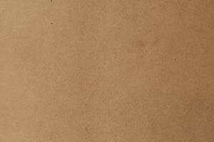 Cardboard brown background. Kraft paper texture sheet horizontal backdrop photo