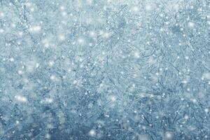 Winter frosty patterns and snow. Christmas background photo