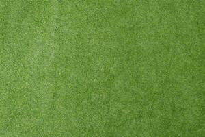 Artificial turf - green grass background photo