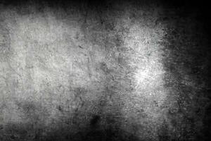 Dark grey or black concrete wall textured background photo