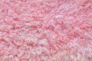 Pink wool texture close-up beautiful abstract fur background photo