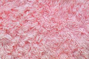 Pink wool texture close-up beautiful abstract fur background photo