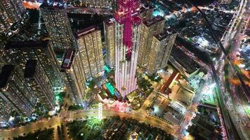 Aerial sunset view at Landmark 81 - it is a super tall skyscraper and Saigon bridge with development buildings along Saigon river light smooth down video