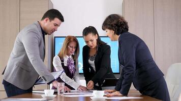 Business team brainstorming in conference room video