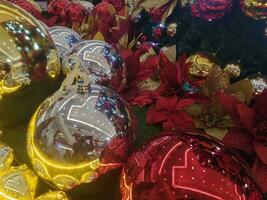 Red and yellow glass ball Christmas tree ornaments photo