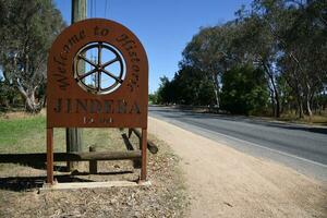 Jindera, New South Wales, Australia - 17 Dec 2023 - Welcome city sign of Jindera, is a small town in the South West Slopes section of the Riverina. photo