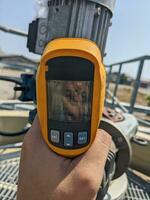 Check temperature of body motor agitator of sludge clarifier photo